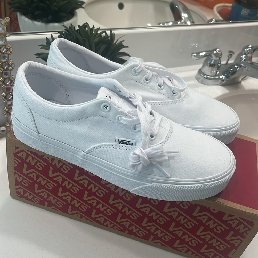 Triple white vans